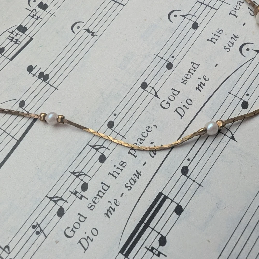 Elegant Gold Necklace with Pearl Accents - Picture 9 of 10